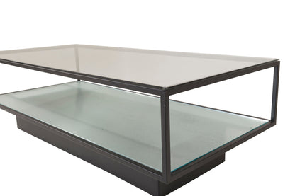 Couchtisch Maglehem aus Glas mit schwarzem Metallrahmen