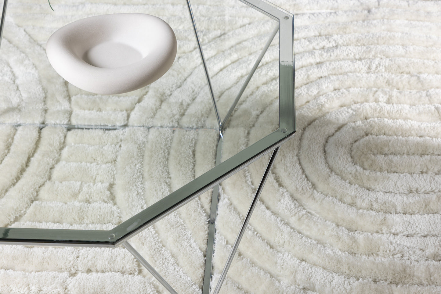 Österlen Couchtisch aus Glas und Stahl in Silber