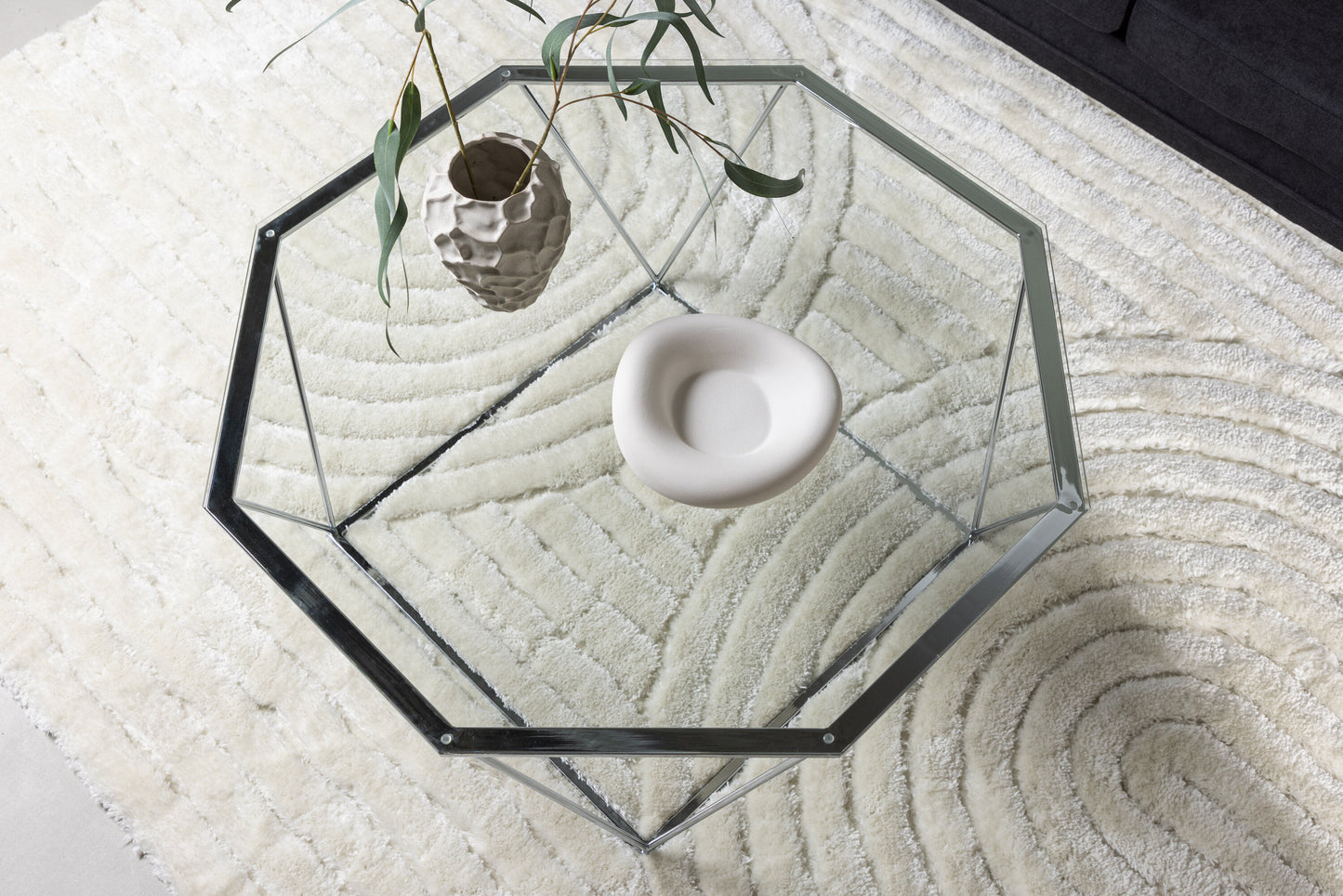Österlen Couchtisch aus Glas und Stahl in Silber