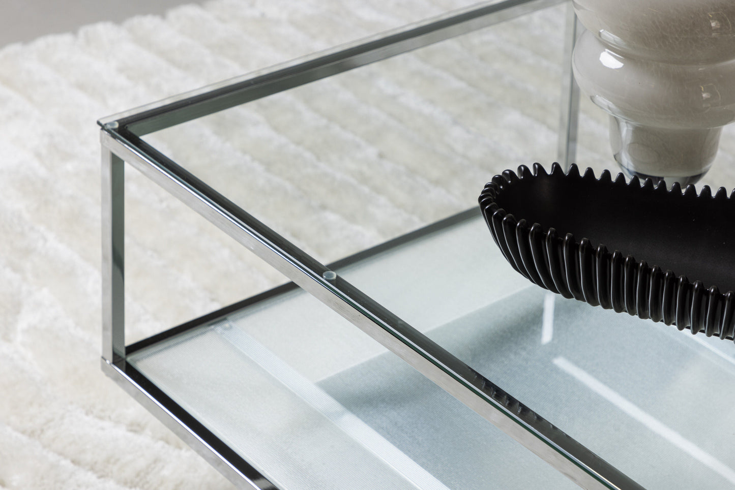 Couchtisch Maglehem aus Glas mit Metallgestell