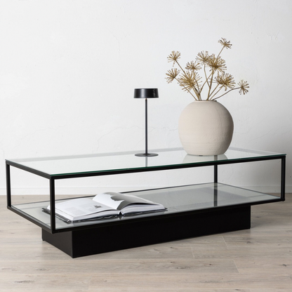 Couchtisch Maglehem aus Glas mit schwarzem Metallrahmen