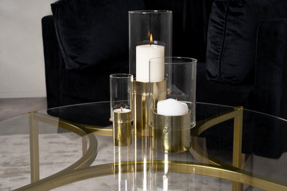 Kivik Couchtisch aus Glas und Stahl in Gold